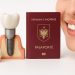 Dental implant components displayed next to an Albanian passport, symbolizing dental tourism for implant treatment in Albania.