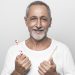 man-holding-toothbrushes